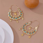 Boucles d'oreilles Savoyardes traditionnelles dorées avec petit Niglo incrusté - Bijou emblématique femme Gitane